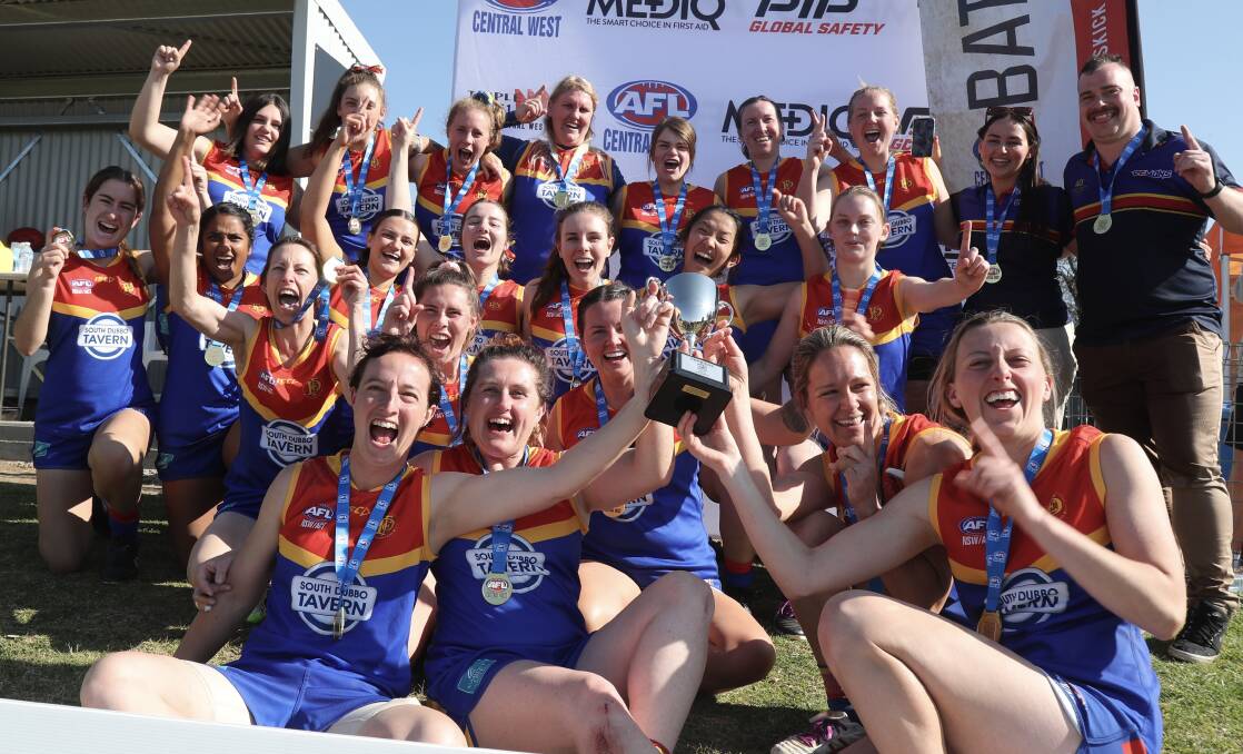 Dubbo Demons celebrate their grand final victory over the Bathurst Giants. Picture by Phil Blatch.
