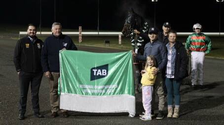 Connections celebrate after Hunter Shannon took out the listed TAB Western Regional Championships Final at Bathurst. Picture by Bathurst Harness Racing Club.