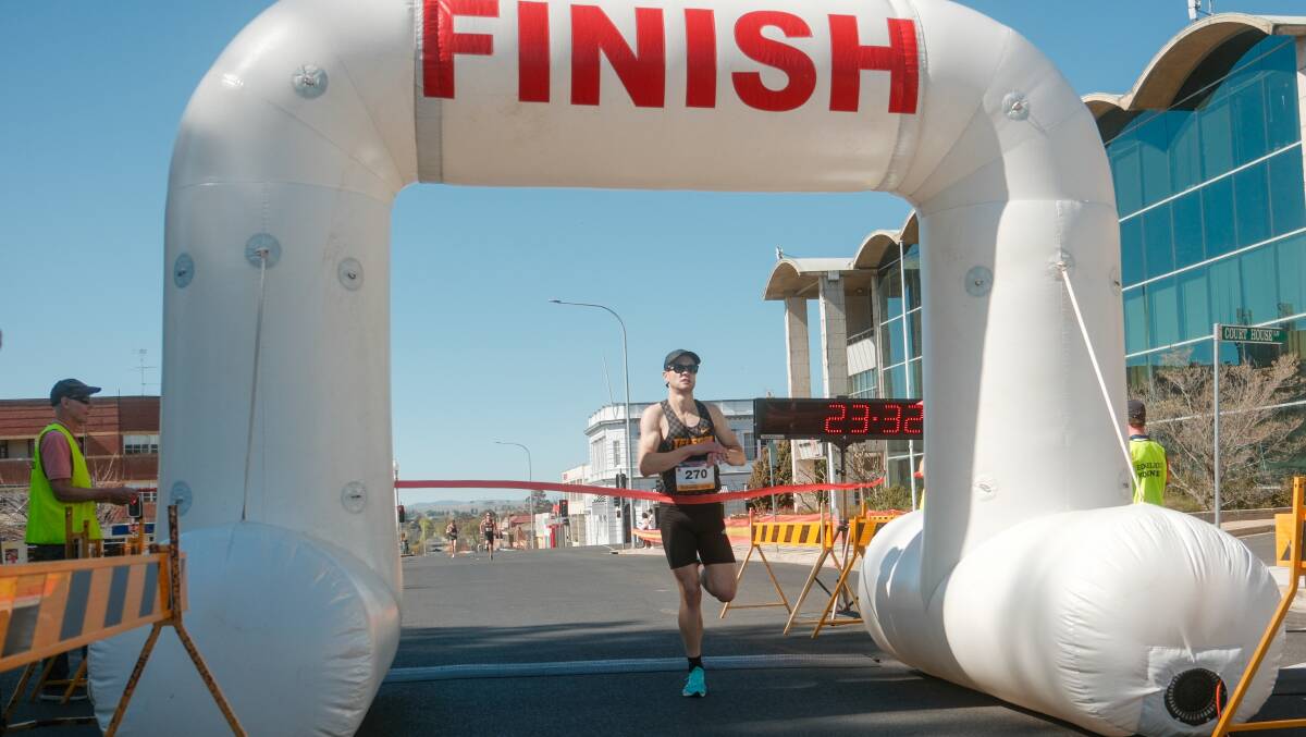 Harry McGill crosses the line to win Sunday's Bathurst Edgell Jog. Picture by James Arrow.