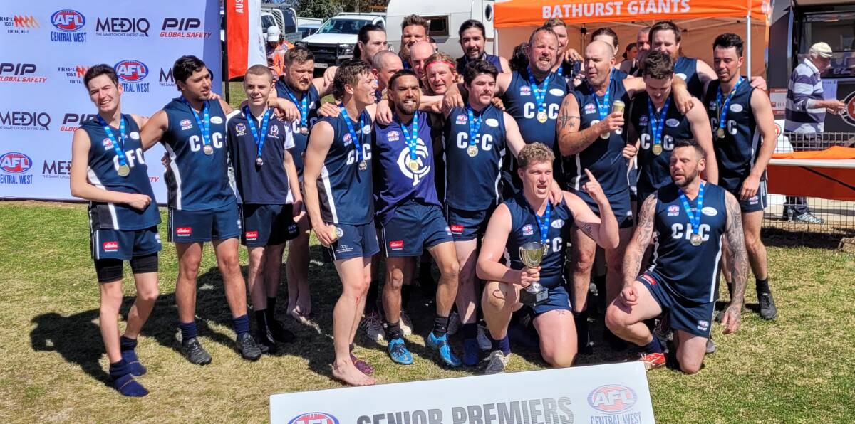 The Cowra Blues celebrate their AFL Central West senior men's tier two win on Saturday. Picture by Alexander Grant.