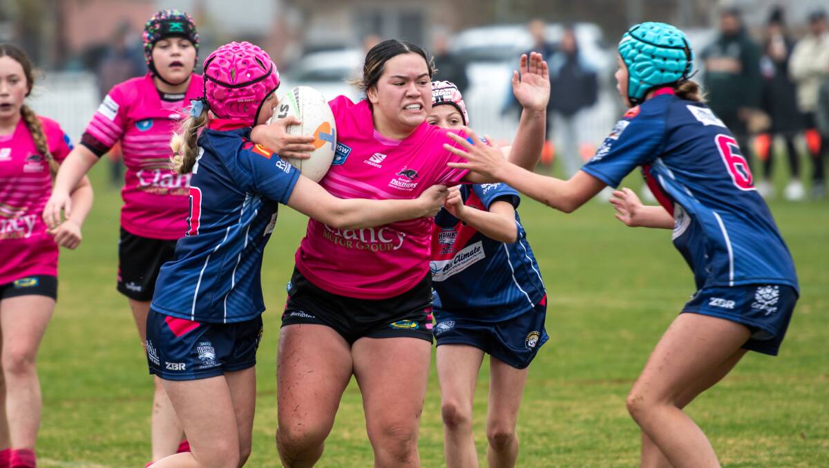 Charisma Gage takes a hit up for Bathurst Panthers Pink. Picture by James Arrow.
