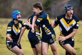 Bathurst High School players celebrate a try during the first half of their game against Dubbo Senior College. Picture by James Arrow