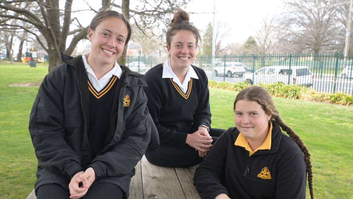 Caitlin, Hailey and Bec Prestwidge have made the big move from one side of Orange to the other. Picture by Jude Keogh