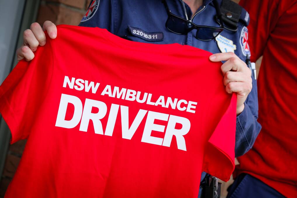A red shirt that read 'NSW Ambulance Driver', which paramedics in Bathurst will be wearing from December 1, 2023. Picture by James Arrow