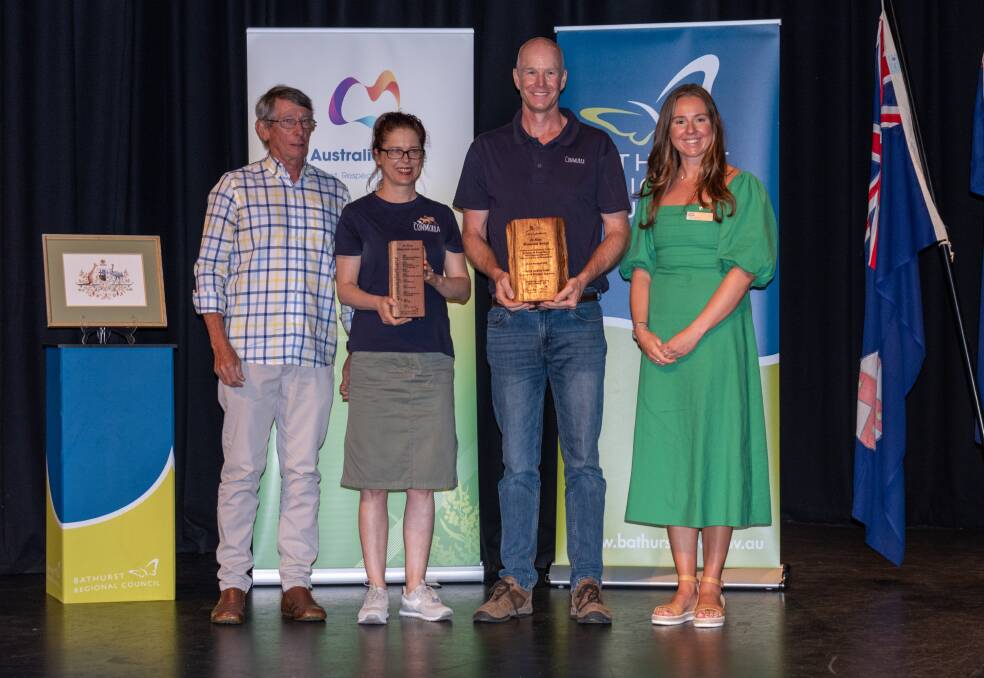 Andrea and Joel Little (centre) with the Jo Ross Memorial Award on Australia Day. Picture by James Arrow