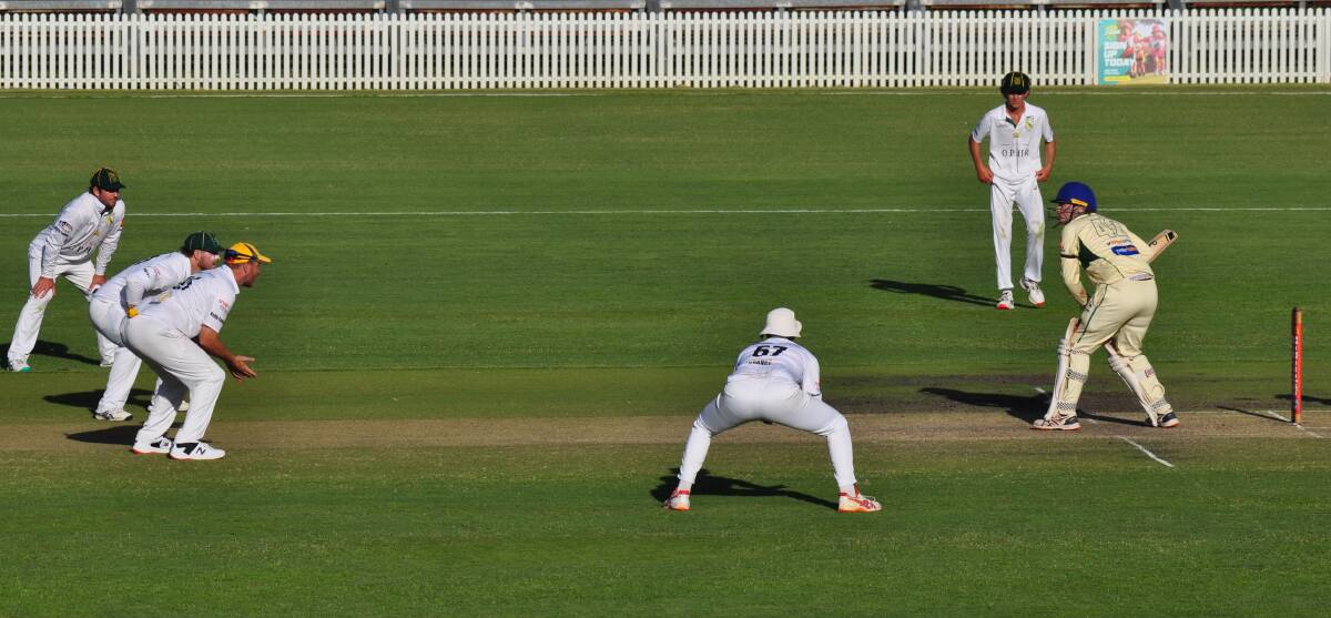 CYMS had no shortage of players around the bat for Tynan Southcombe. Picture by Lachlan Harper 